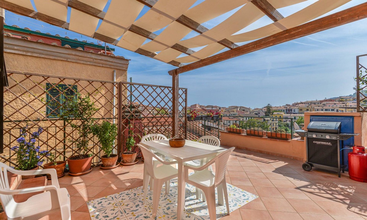 Capoliveri Apartment | Apartment 'Casa La Torre' with Sea View, Shared Terrace and Wi-Fi
