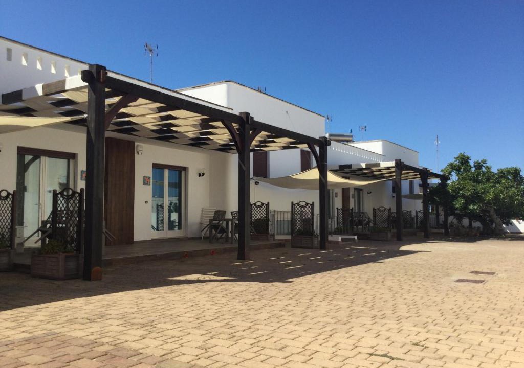 Posto Rosso House | Appartamenti a 50 mt dal mare a Posto Rosso