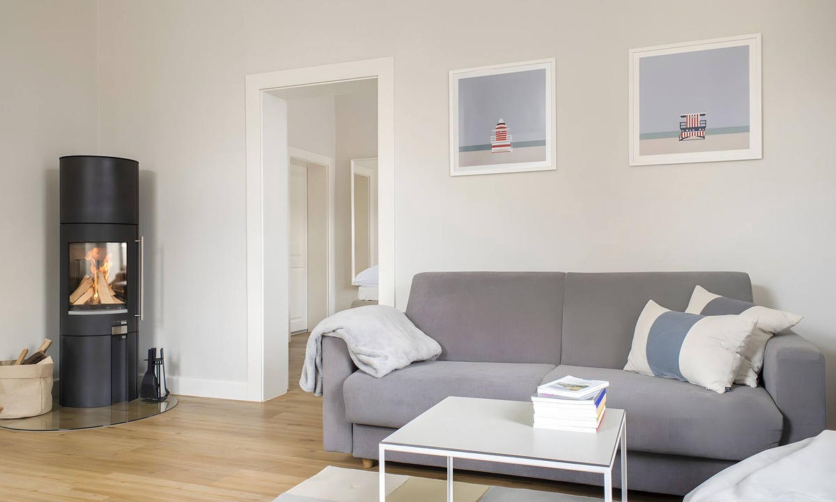 Lemkenhafen Apartment | Bright Stuuv – Comfortable Living with Sunny Terrace and Fireplace