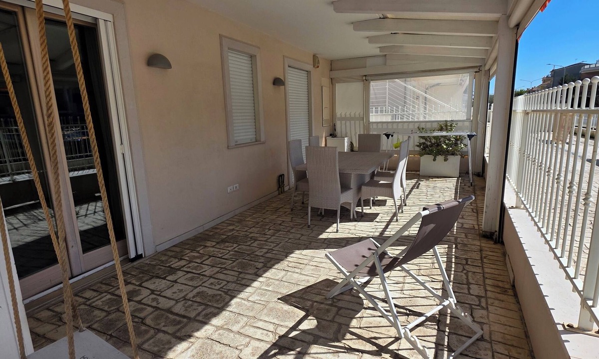 Lido di Fermo Apartment | Elegantly renovated beachfront apartment with a courtyard and parking space