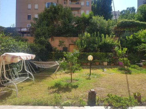 Torrino Apartment | EUR Charme Apt&GARDEN