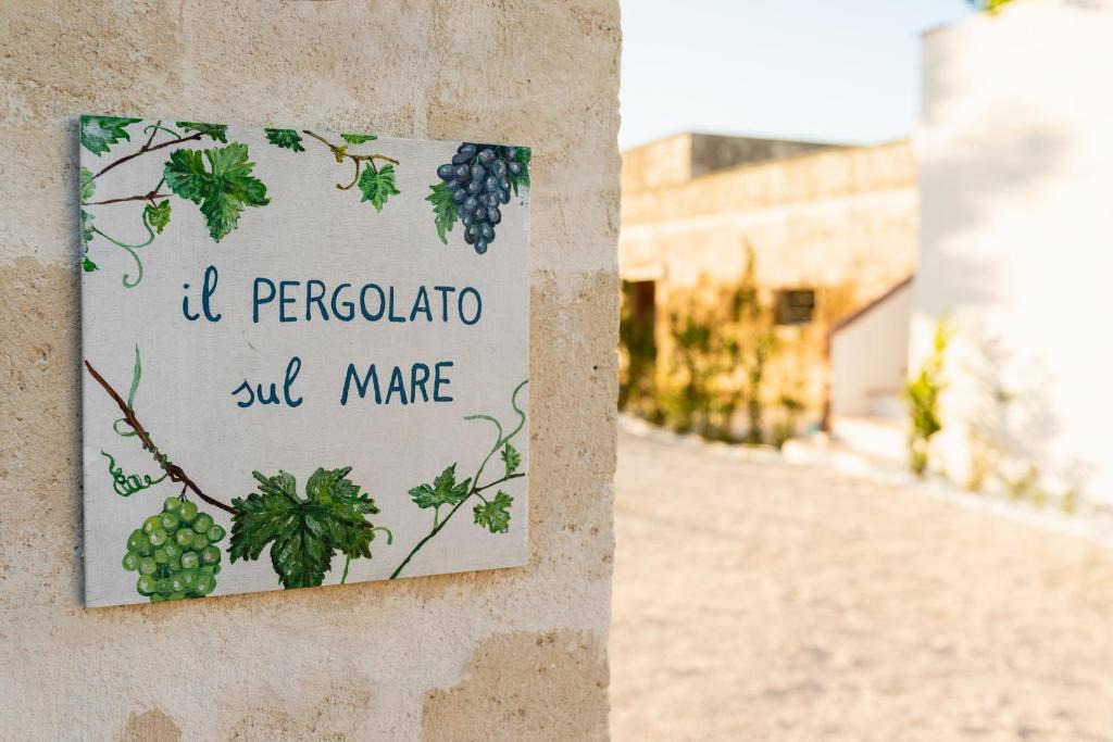Capitolo House | Il pergolato sul mare