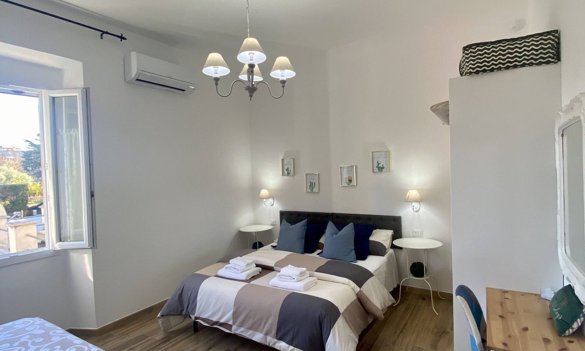Prenestino-Centocelle Apartment | MenasiHome Your home just a 2-minute walk from the metro stop.