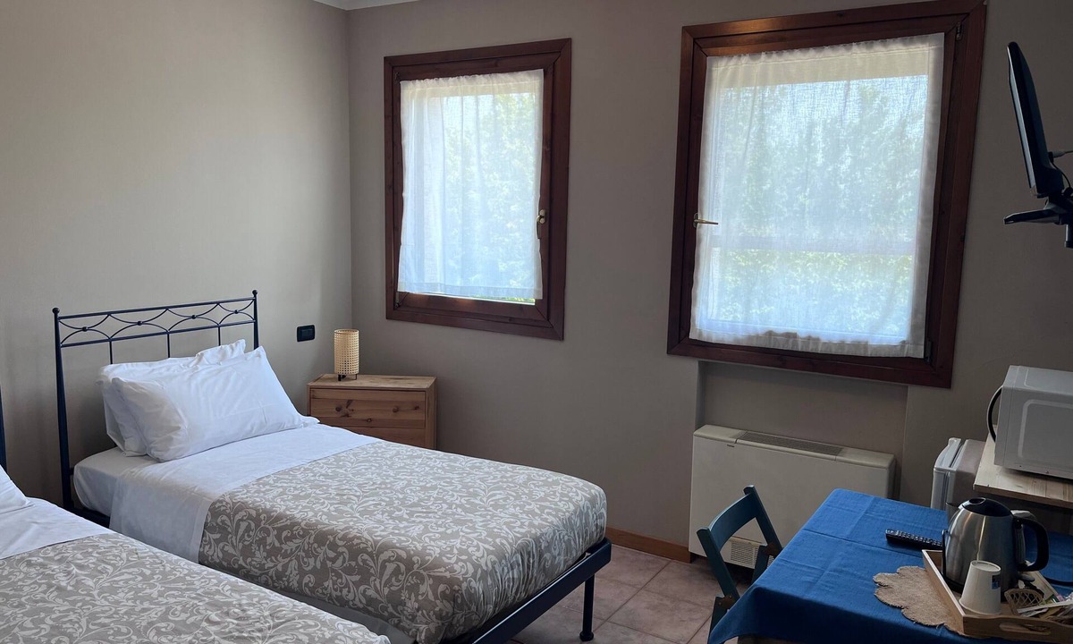 Santa Maria di Sala Apartment | Papaveri E Papere Room – Selleria in Caltana