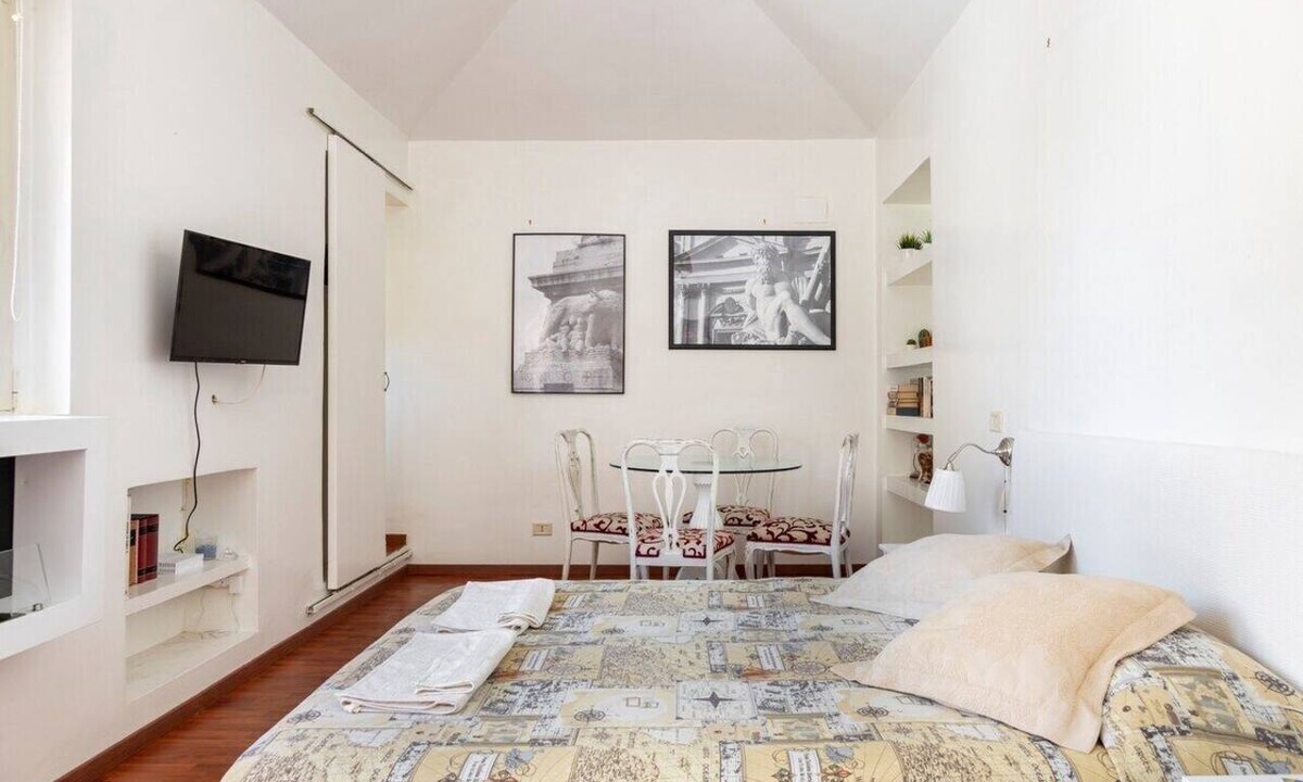 Rione III Colonna Apartment | Terrazzo Frattina Penthouse with terrace close to Spanish Steps
