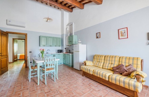 San Martino in Campo Apartment | A charming 65 sqm apartment, ideal for four people, located on the first floor of a building without an elevator.The apartment is located in a charming Umbrian-style farmhouse, with ample green space, relaxation areas, and a shared swimming pool. Its loc