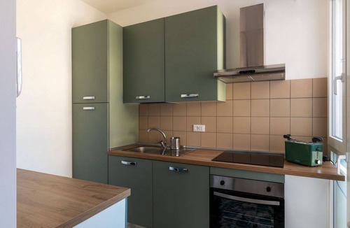 Universita Apartment | A comfortable and welcoming 48 square meters apartment, perfect for two people, located on the fifth and top floor of a building with an elevator (NOT accessible to disabled guests).The property is located very close to Rome Tiburtina Station (400 meters