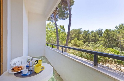 Acaya Apartment | A cozy studio apartment with a balcony and kitchenette—perfect for two—located within the Campoverde Residence in Vernole, set in a Mediterranean pine forest between San Cataldo and the Le Cesine Nature Reserve. The property is just a short distance
