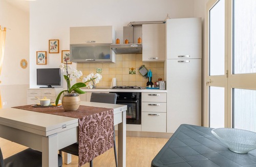 Torre Ovo Apartment | Apartment 'Casa Vacanza Torre Ovo' with Private Terrace, Wi-Fi and Air Conditioning