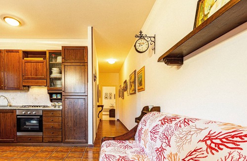 Porto Azzurro Apartment | Apartment 'Il Porto' Near the Beach with Balcony, Terrace & Garden