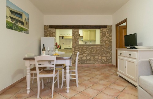 Cecina House | Apartment 'Podere Nuti - 4 Lauro' with Pool, Garden & Shared Wi-Fi