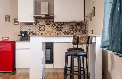 Pitigliano Apartment | Apartment 'Quercia' with Shared Garden and Air Conditioning