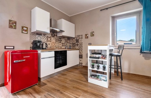Pitigliano Apartment | Apartment 'Quercia' with Shared Garden and Air Conditioning