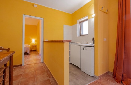 Capalbio Apartment | Apartment 'Rosaspina - 6' with Shared Pool, Wi-Fi and Air Conditioning
