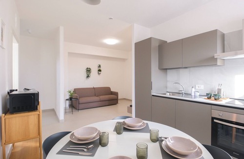 Marcianise Apartment | ARQO Apartments - Spacious Apartment with 2 Bathrooms and Courtyard View