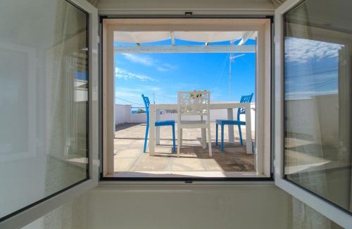 Posto Rosso House | Attico Bluè vista mare - Apulia Home