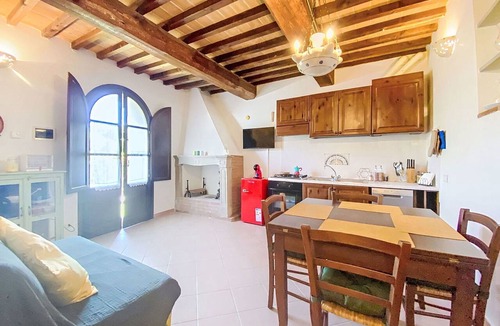 Pieve di Santa Luce Apartment | Beautiful apartment for 4 people with A/C, WIFI, pool, TV, patio and pets allowed