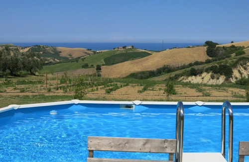 Cologna Spiaggia Villa | Beautiful apartment in villa with pool, A/C, WIFI, hot tub, TV, patio, pets allowed, panoramic view