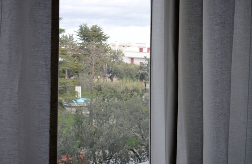 Sammichele di Bari Apartment | Bright and spacious three-room apartment, two bathrooms, overlooking the green, terraces, 8 beds