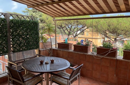 Quartiere XXVII Primavalle Apartment | Bright penthouse within walking distance of the wonderful center of Rome.