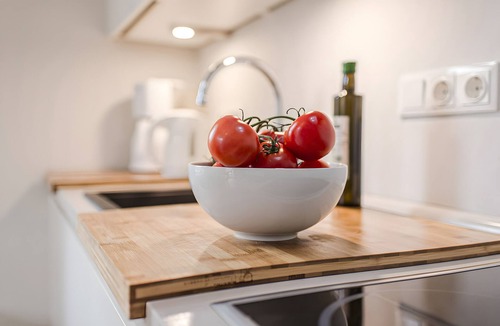 Lemkenhafen Apartment | Bright Stuuv – Comfortable Living with Sunny Terrace and Fireplace