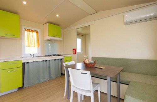 Bibbona House | Bungalow 'Sole2' with Shared Pool, Private Terrace and Air Conditioning