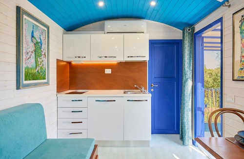 Suvereto House | Caravan 'Gitano Pavone Blu' with Private Terrace, Shared Garden and Air Conditioning
