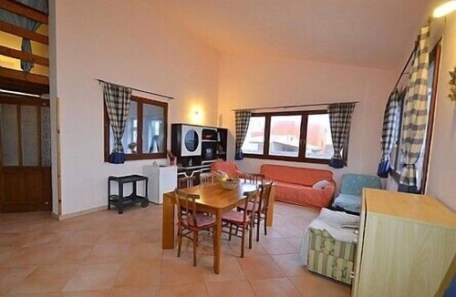Santa Maria del Focallo House | Casa Cigno B: A characteristic apartment that is part of a small villa.