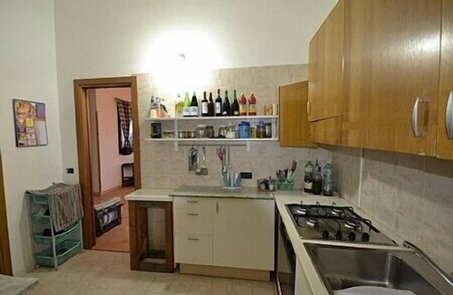 Santa Maria del Focallo House | Casa Cigno B: A characteristic apartment that is part of a small villa.