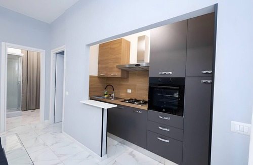 Quartiere XXXIII Lido di Ostia Ponente Apartment | Cf Luxury House Apartment with Balcony, Wi-Fi and Air Conditioning