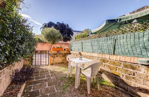 Quartiere XIII Aurelio Apartment | Charming Apartment with Garden, Parking & Metro