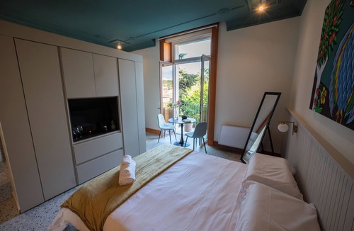 Acireale Bed & Breakfast | Charming elegant room in central Acireale with serene garden view