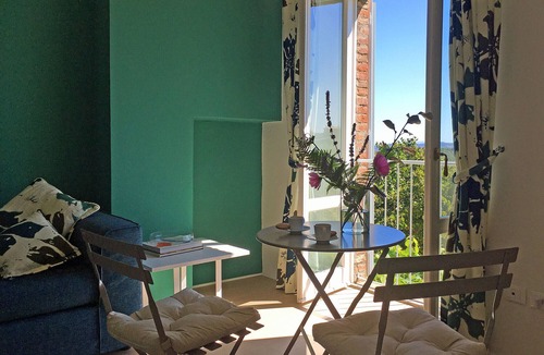 Citta della Pieve Apartment | Contemporary decor in a Medieval townhouse: studio suite with Umbrian hill views