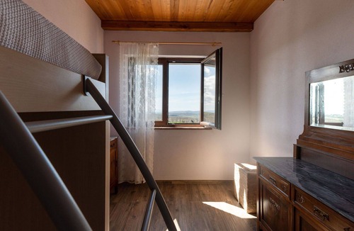 Scansano House | Cosy apartment in villa for 3 people with WIFI, patio, pets allowed and panoramic view