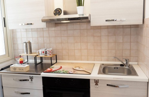 Quartiere XX Ardeatino Apartment | Cozy 2-bedroom apartment in enjoyable Roma with WiFi, AC