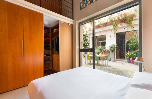 Monti Apartment | Dramatic Arches, Striking Architectural Apartment in Monti District Colosseum