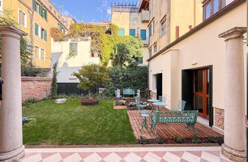 Castello Apartment | Elegant Waterfront Home with Shared Garden on Venice's Zattere Promenade