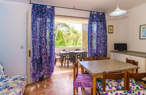 Bibione Pineda Apartment | Gabbiano tree-room flat surrounded by the green of the quite pine forest