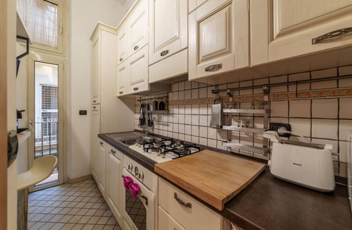 Rione XVIII Castro Pretorio Apartment | GuestHost - Comfortable apartment located on the second floor, of four in total, of a building without lift.In 40 m2 of space it accommodates four people with a double bedroom on the mezzanine and a foldaway double bed in the living room.It is located 70