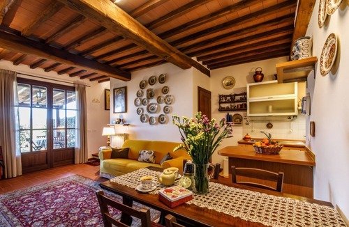 Monteaperti Apartment | GuestHost - Nestled between the Crete Senesi and Chianti, this home offers a breathtaking view of the countryside and Siena, just a 10-minute drive away. Part of a renovated historic farmhouse, it is a well-furnished townhouse with a private garden and v