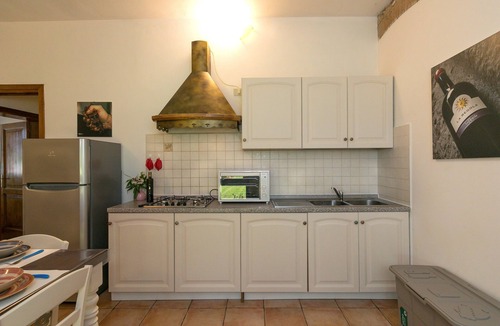 Cecina Apartment | Holiday Apartment 'Podere Nuti - 1 "La Regola"' with Shared Pool, Terrace & Wi-Fi