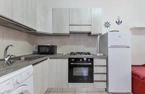 Innamorata House | Holiday Home 'Innamorata Mare' with Sea View, Private Terrace and Wi-Fi