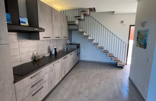Principina a Mare House | Holiday Home 'Rio Home' with Private Terrace and Air Conditioning