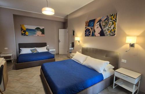 Belpasso Bed & Breakfast | "La città delle 100 sculture" B&B BcenS con parcheggio privato e trasfert H24 - Belpasso - Etna -