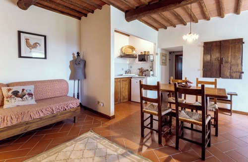 Greve in Chianti Apartment | La Loggetta apartment in farmhouse with swimming pool surrounded by greenery