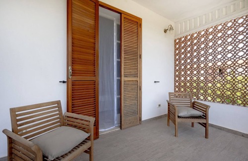 Monti D'arena-Bosco Caggione Apartment | Large studio apartment perfect for two people, is located in a shared villa but has its own private access. It features a shared garden and a large furnished patio for exclusive use. The accommodation is located in Marina di Pulsano, a well-served seasid