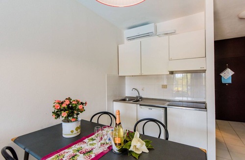 Marina di Bibbona Apartment | Lovely apartment for 4 people with A/C, pool, WIFI, TV, terrace and pets allowed