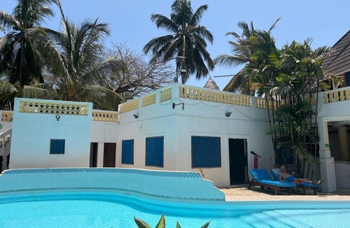 Galu Beach House | Luxurious 3-Bedroom Holiday House with Pool Access in Diani Beach