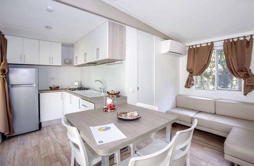 Roccamare House | Mobilehome with air conditioning, pool in a sunny location