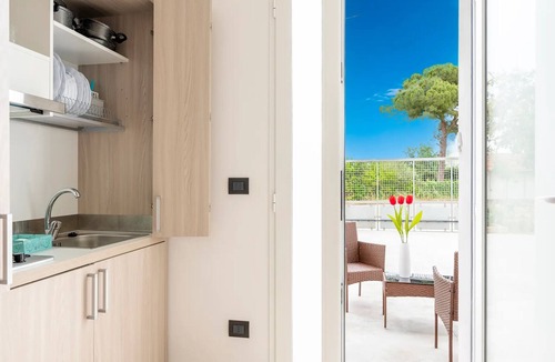 Boncore House | Monolocale Riva – Wi-Fi, Clima e Giardino a Torre Lapillo